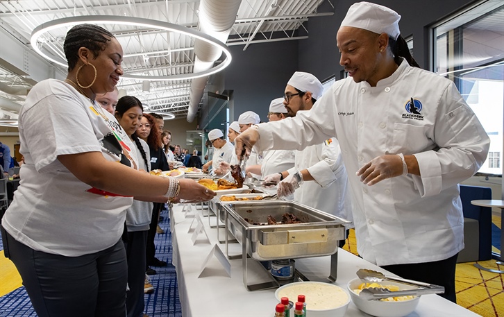 Attendees in line for food at the Soul Food Luncheon
